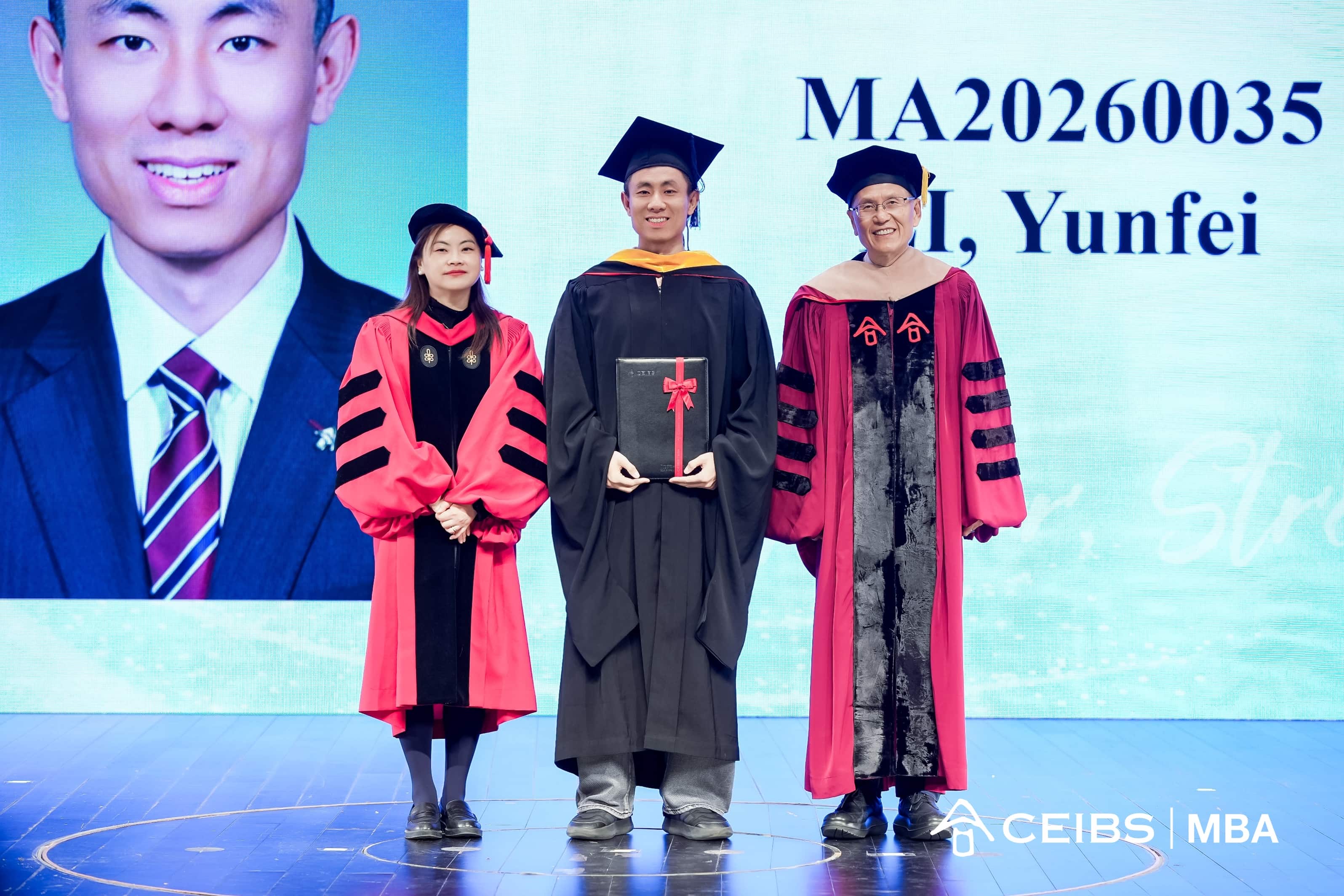 Professors present graduation certificates  to graduates